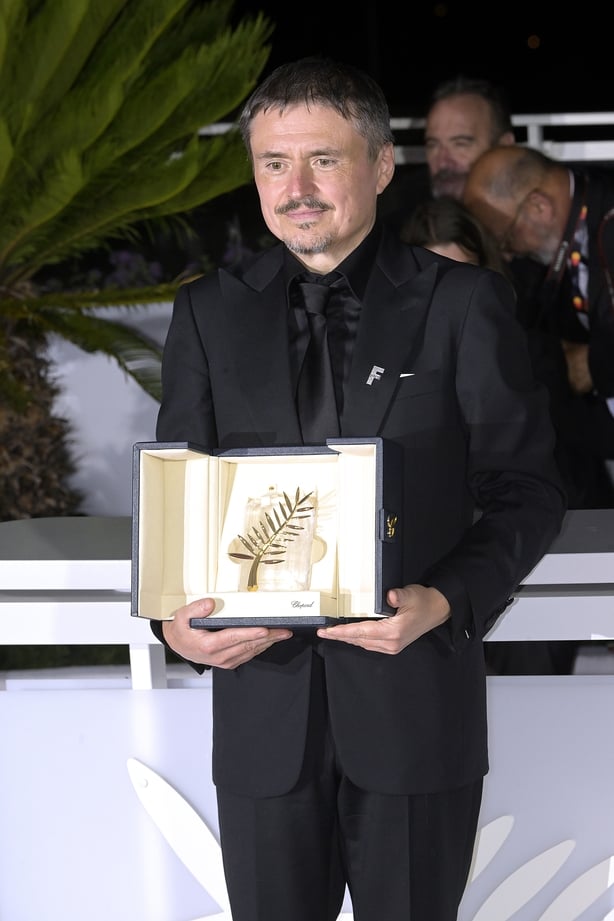 Romanian director Cristian Mungiu, winner of the Palme d'Or for the film Fjord, at Palme D'Or Winners Photocall during the 2026 Cannes Film Festival in Cannes (France), May 24th, 2026 (Photo by Rocco Spaziani/Archivio Spaziani/Mondadori Portfolio via Getty Images )