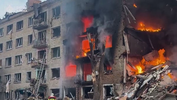 A building burns in Kyiv after a Russian drone strike (Reuters keyframe)