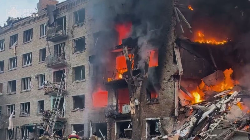 A building burns in Kyiv after a Russian drone strike (Reuters keyframe)