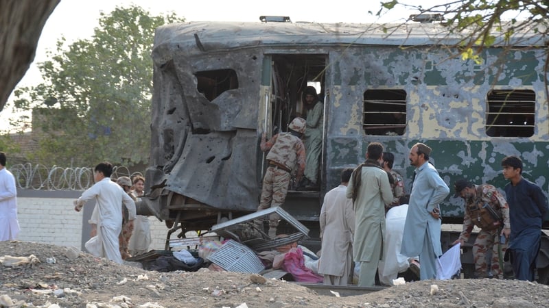 Blast on train in Pakistan kills dozens