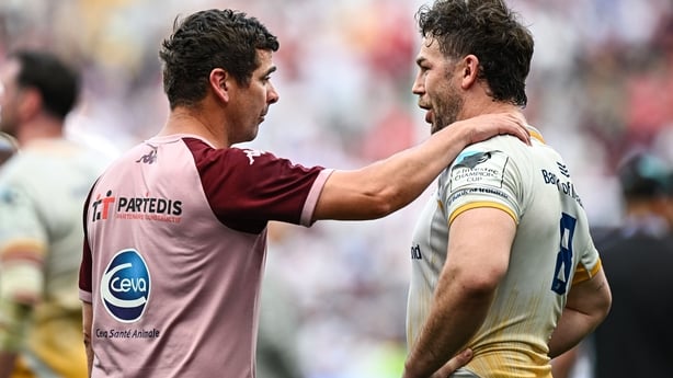 23 May 2026; Leinster captain Caelan Doris with Bordeaux Begles attack coach Noel McNamara after the Investec Champions Cup final match between Leinster and Union Bordeaux Bégles at San Mamés Stadium in Bilbao, Spain. Photo by Seb Daly/Sportsfile