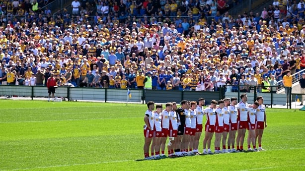24 May 2026; The Tyrone players observe a minutes silence in memory of former player Frank McGuigan during the GAA Football All-Ireland Senior Championship Round 1 match between Roscommon and Tyrone at King & Moffatt Dr. Hyde Park in Roscommon. Photo by Paul Phelan/Sportsfile