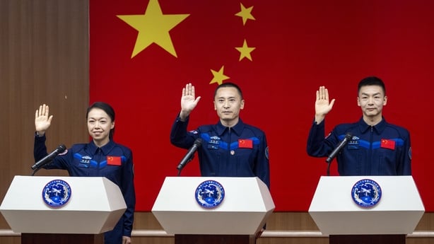 Chinese astronauts Zhu Yangzhu (C), Zhang Zhiyuan (R) and Li Jiaying