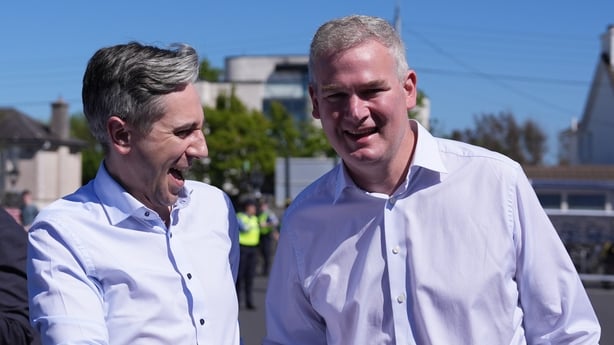 Seán Kyne, Tanaiste Simon Harris greet each other outside Galway West count centre