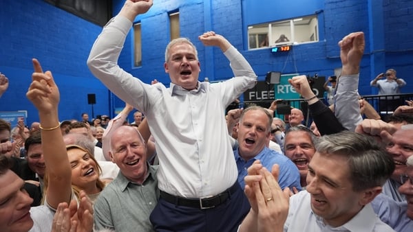 Fine Gael candidate Sean Kyne celebrates with Tanaiste and Fine Gael leader Simon Harris