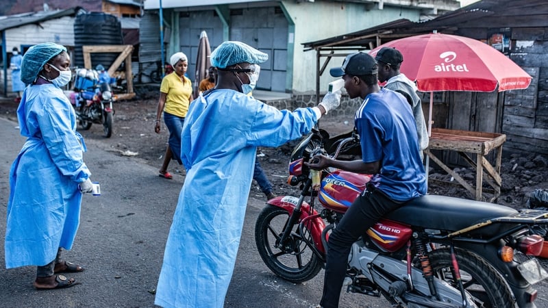 Health workers conduct temperature screenings and health checks on travelers at the Kanyaruchinya checkpoint on May 24, 2026 in Goma, Democratic Republic of Congo. Health officials have implemented additional health checks at the Kanyaruchinya checkpoint