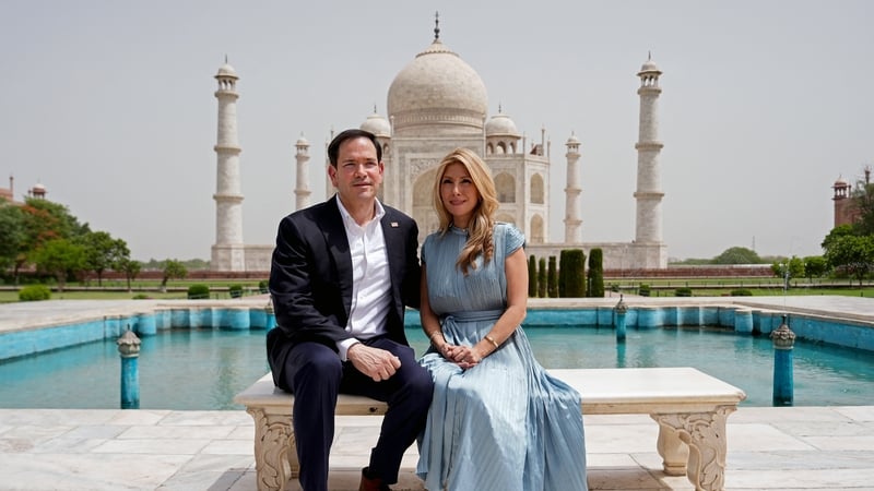 US Secretary of State Marco Rubio poses alongside his wife Jeanette at the Taj Mahal in Agra on May 25, 2026. (Photo by Julia Demaree Nikhinson / POOL / AFP)