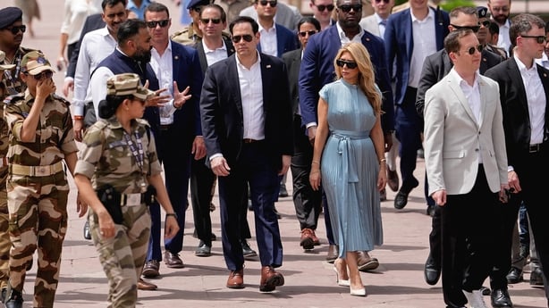 US Secretary of State Marco Rubio (C), his wife Jeanette (centre R) and US ambassador to India Sergio Gor (2R) visit the Taj Mahal in Agra on May 25, 2026. (Photo by Julia Demaree Nikhinson / POOL / AFP)
