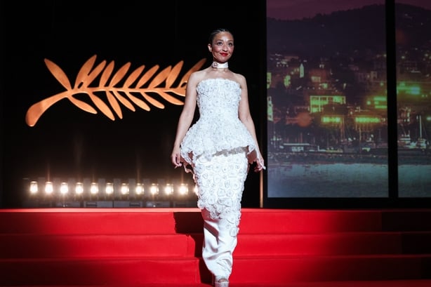 Member of the jury Irish-Ethiopian actress and producer Ruth Negga arrives on stage during the closing ceremony of the 79th edition of the Cannes Film Festival in Cannes, southern France, on May 23, 2026. (Photo by Valery HACHE / AFP)