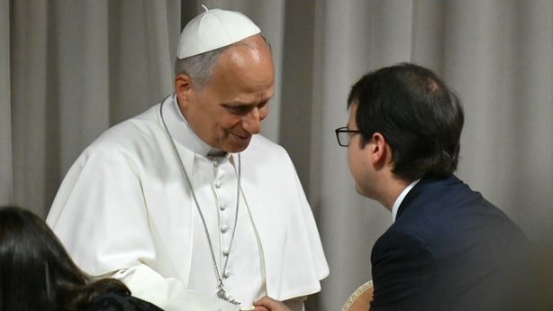 Christopher Olah, shakes hands with Pope Leo XIV 