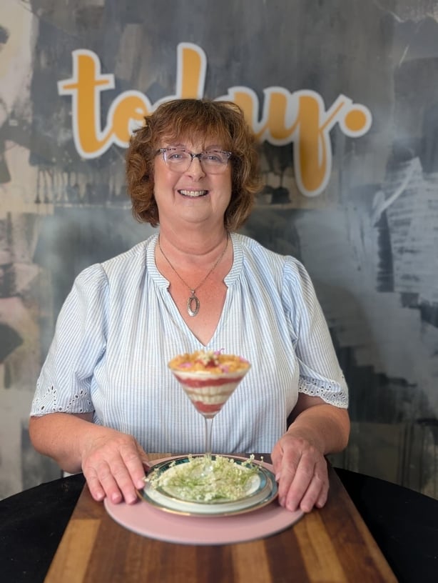Margaret Leahy with her cheesecake
