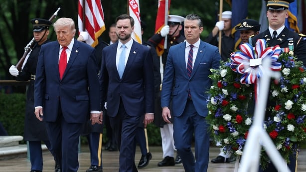U.S. President Donald Trump, Vice President JD Vance and Secretary of War Pete Hegseth participate in a Memorial Day wreath-laying ceremony at the Tomb of the Unknown Soldier at Arlington National Cemetery on May 25, 2026 in Arlington, Virginia. Memorial Day honors those who died while serving in th