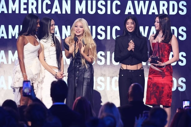 Lara Raj, Daniela Avanzini, Yoonchae Jeong, Sophia Laforteza, and Megan Skiendiel of KATSEYE accept the New Artist of the Year award at The 52nd American Music Awards at the MGM Grand Garden Arena on 25 May, 2026 in Las Vegas, Nevada. (Photo by Rich Polk/Dick Clark Productions via Getty Images)