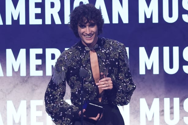 Sombr accepts the Best Rock/Alternative Album award for I Barely Know Her at the 52nd American Music Awards at the MGM Grand Garden Arena on 25 May, 2026 in Las Vegas. (Photo by Rich Polk/Dick Clark Productions via Getty Images)