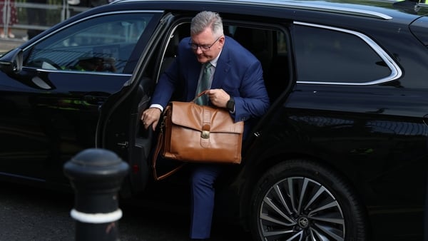 Jeffrey Donaldson gets out of a car outside at Newry Crown Court