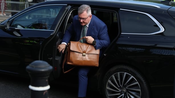 Jeffrey Donaldson gets out of a car outside at Newry Crown Court
