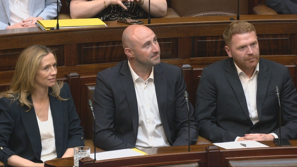 TD Daniel Ennis beside party colleagues Holly Cairns and Gary Gannon