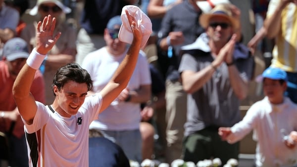 Adam Walton celebrates his surprise victory over Daniil Medvedev