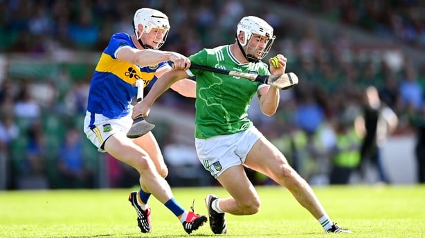 Tipperary's Bryan O'Mara tries to put the shackles on Limerick ace Aaron Gillane