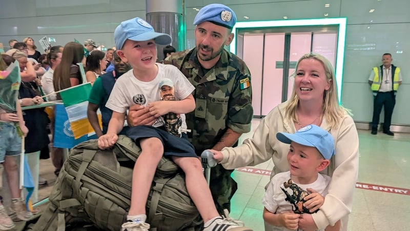 Derek Forrester and Nicola Byrne with Caolan and Cathal Forrester at Dublin Airport Terminal 2 as peacekeepers from the 127th Infantry Battalion return home after their deployment to Lebanon as part of the United Nations Interim Force Lebanon