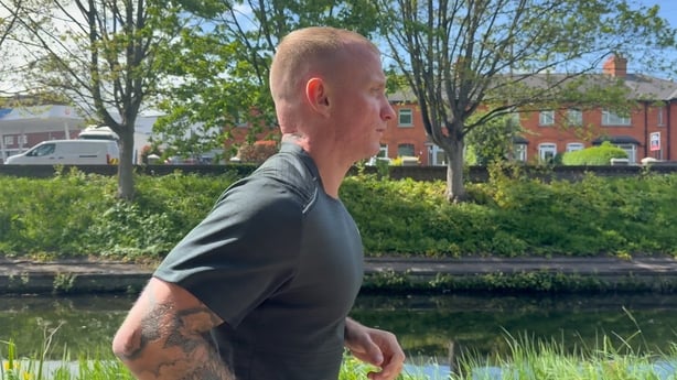 Chris Connolly runs along the Grand Canal in Dublin