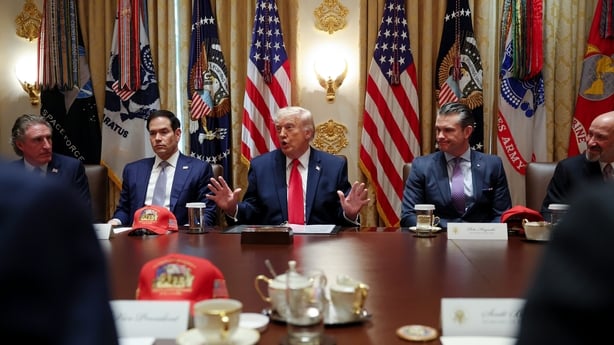 WASHINGTON, DC - MAY 27: U.S. President Donald Trump (C) speaks as (L-R) U.S. Interior Secretary Doug Burgum, U.S. Secretary of State Marco Rubio, U.S. Secretary of War Pete Hegseth and U.S. Commerce Secretary Howard Lutnick listen during a Cabinet meeting in the Cabinet Room of the White House on M