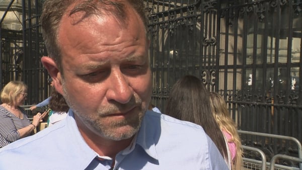Craig Coady speaking outside Leinster House