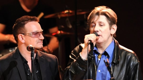 Bono and Shane MacGowan perform at Carnegie Hall during the (RED)NIGHTS Concert celebrating the music of Gavin Friday on October 4, 2009 in New York City.