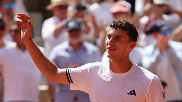 Juan Manuel Cerundolo of Argentina shows appreciation to the fans after victory in his Men's Singles second round match against Jannik Sinner of Italy on Day Five of the 2026 French Open at Roland Garros on May 28, 2026 in Paris, France.