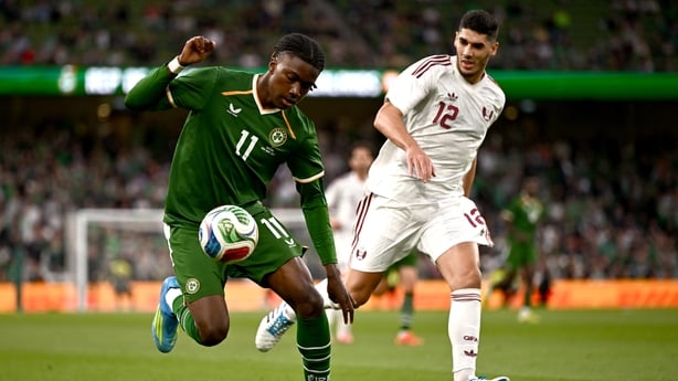 Jaden Umeh of Republic of Ireland in action against Karim Boudiaf of Qatar during the international friendly match between Republic of Ireland and Qatar at the Aviva Stadium in Dublin.