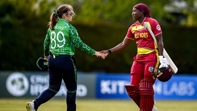 Clontarf's Cara Murray and Stafanie Taylor of West Indies shake hands after the T20 Tri-Series match at Clontarf