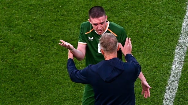 Jack Moylan of Republic of Ireland is consoled by manager Heimir Hallgrimsson as he leaves the pitch after being shown a red card during the international friendly match between Republic of Ireland and Qatar at the Aviva Stadium in Dublin.