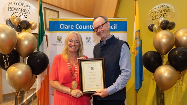 Clare artist Mick O'Dea and Mayor of Clare Mary Howard at a mayoral reception