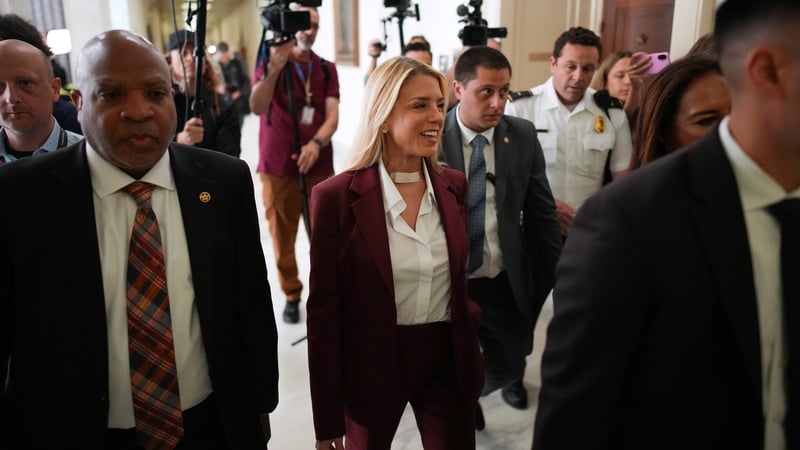 WASHINGTON, DC - MAY 29: Former U.S. Attorney General Pam Bondi (C) arrives to testify at a closed-door interview with the House Oversight Committee on Capitol Hill on May 29, 2026 in Washington, DC. Bondi will be asked questions on the federal government