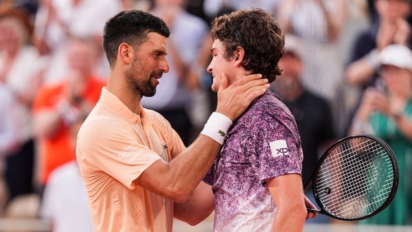 PARIS, FRANCE - MAY 29: Joao Fonseca (R) of Brazil greets Novak Djokovic of Serbia after their Men's Singles Third Round match during Day six of the 2026 French Open at Roland Garros on May 29, 2026 in Paris, France. (Photo by Shi Tang/Getty Images)