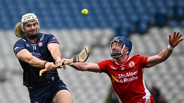 Thomas Douglas of New York (L) in action against Cormac Munroe of Tyrone - 2026 Nicky Rackard final