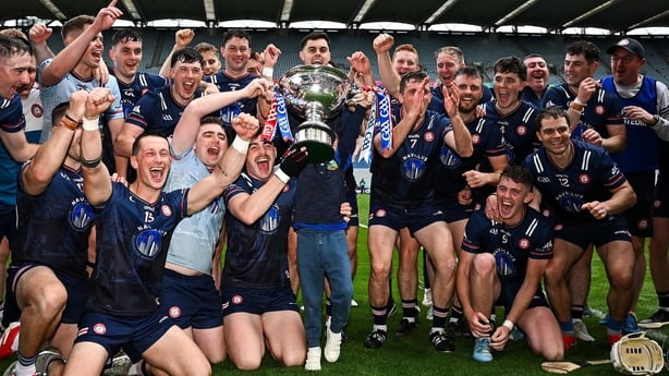 New York players celebrate with the Nickey Rackard Cup 