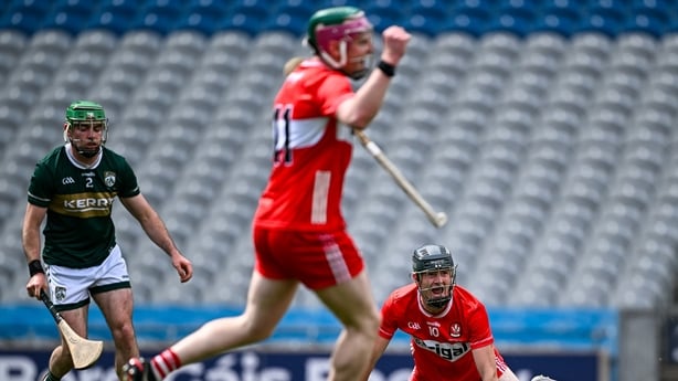 Connor Melaugh of Derry, right, celebrates after scoring his side's first goal against Kerry in 2026 Christy Ring Cup final