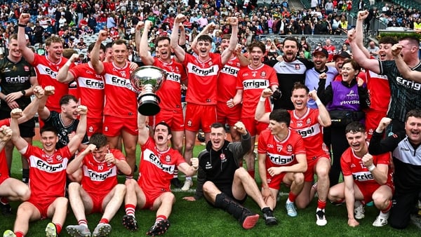 Derry players celebrate with the Christy Ring Cup