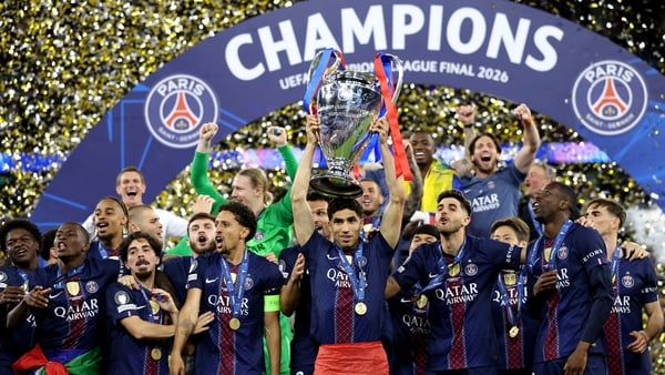 Achraf Hakimi of Paris Saint-Germain celebrates with the UEFA Champions League trophy after his team's victory in the UEFA Champions League Final 2026 match between Paris Saint-Germain and Arsenal FC at Puskas Arena on May 30, 2026 in Budapest, Hungary. (