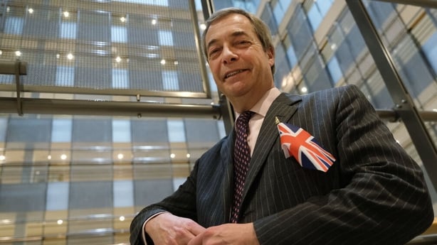 Former Brexit Party leader Nigel Farage poses for a photo while taking a break during a session of the European Parliament