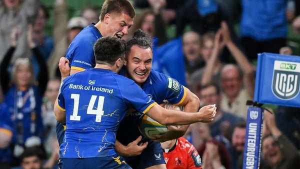 30 May 2026; James Lowe of Leinster, right, celebrates with teammates Jimmy O'Brien, 14, and Sam Prendergast after scoring their side's eighth try to become the new Leinster record try scorer during the United Rugby Championship quarter-final match betwee