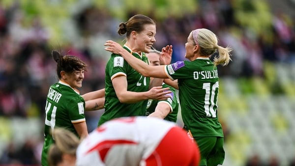 Emily Murphy of Republic of Ireland, centre, celebrates with teammate Denise O’Sullivan after scoring their side's first goal during the 2027 FIFA Women’s World Cup Qualifier match between Poland and Republic of Ireland at Polsat Plus Arena in Gdansk, Pol