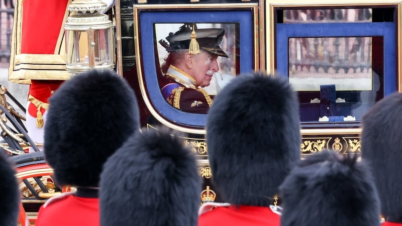 Grenadier Guards seen standing as King Charles III and Queen Camilla travel along The Mall towards Buckingham Palace in the Diamond Jubilee State Coach after attending the State Opening of Parliament. (Photo by Dinendra Haria/SOPA Images/LightRocket via G