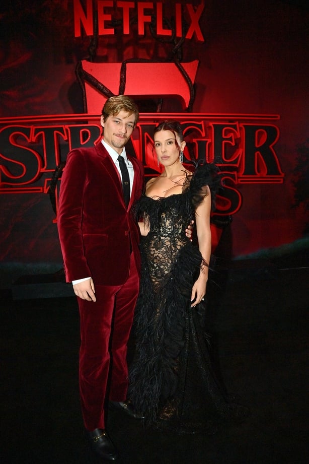 HOLLYWOOD, CALIFORNIA - NOVEMBER 06: (L-R) Jake Bongiovi and Millie Bobby Brown attend Netflix's "Stranger Things" Season 5 World Premiere at TCL Chinese 6 Theatres on November 06, 2025 in Hollywood, California. (Photo by Jerod Harris/Getty Images for Netflix)