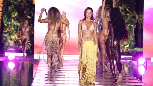 Maura Higgins and models walk the runway at the Sports Illustrated Swimsuit Runway Show during Swim Week At W South Beach at W South Beach on May 30, 2026 in Miami Beach, Florida. (Photo by John Parra/Getty Images for Sports Illustrated)