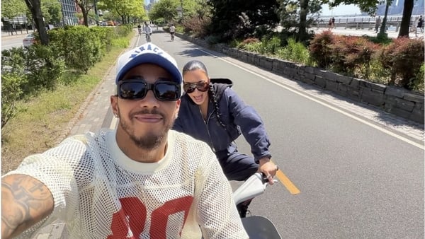 British F1 star and a reality star on a bike ride