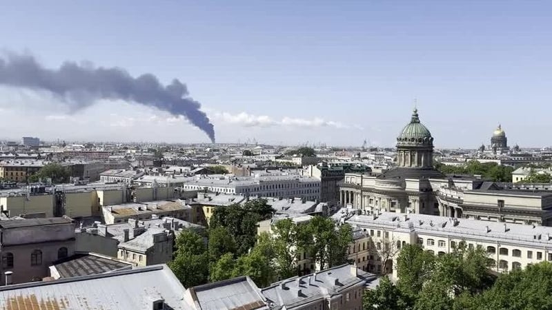 Smoke rises over St Petersburg after Ukrainian drones struck an oil terminal in the Russian city (Reuters keyframe)